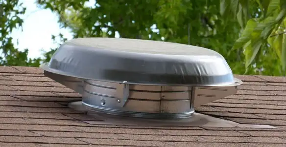 attic fan installation services with low-profile roof ventilation unit in Escondido, CA