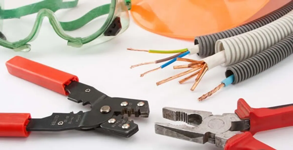 Electrical wiring repair with professional tools and safety equipment in Valley Center, CA