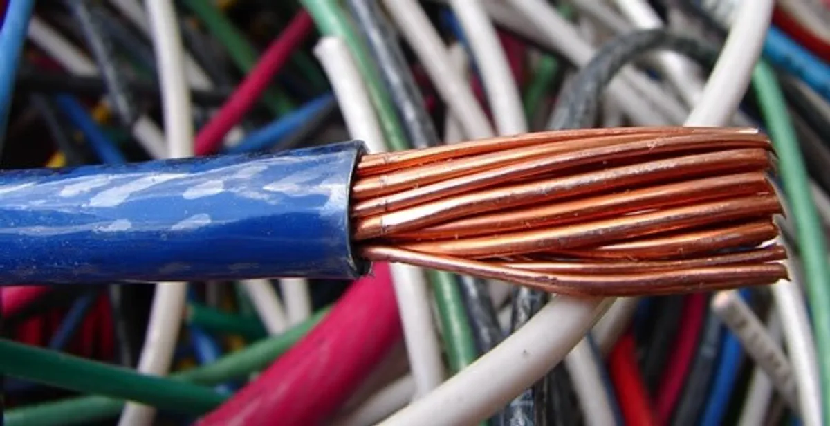 electrical wiring services showing exposed copper conductors and cable preparation in Escondido, CA