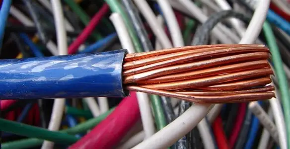 electrical wiring services showing exposed copper conductors and cable preparation in Escondido, CA