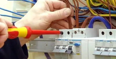 electrician services performing professional electrical panel wiring and connections in Escondido, CA