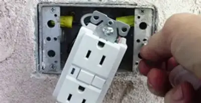 gfci circuits service showing installation of a ground fault circuit interrupter outlet by licensed electricians in Escondido, CA