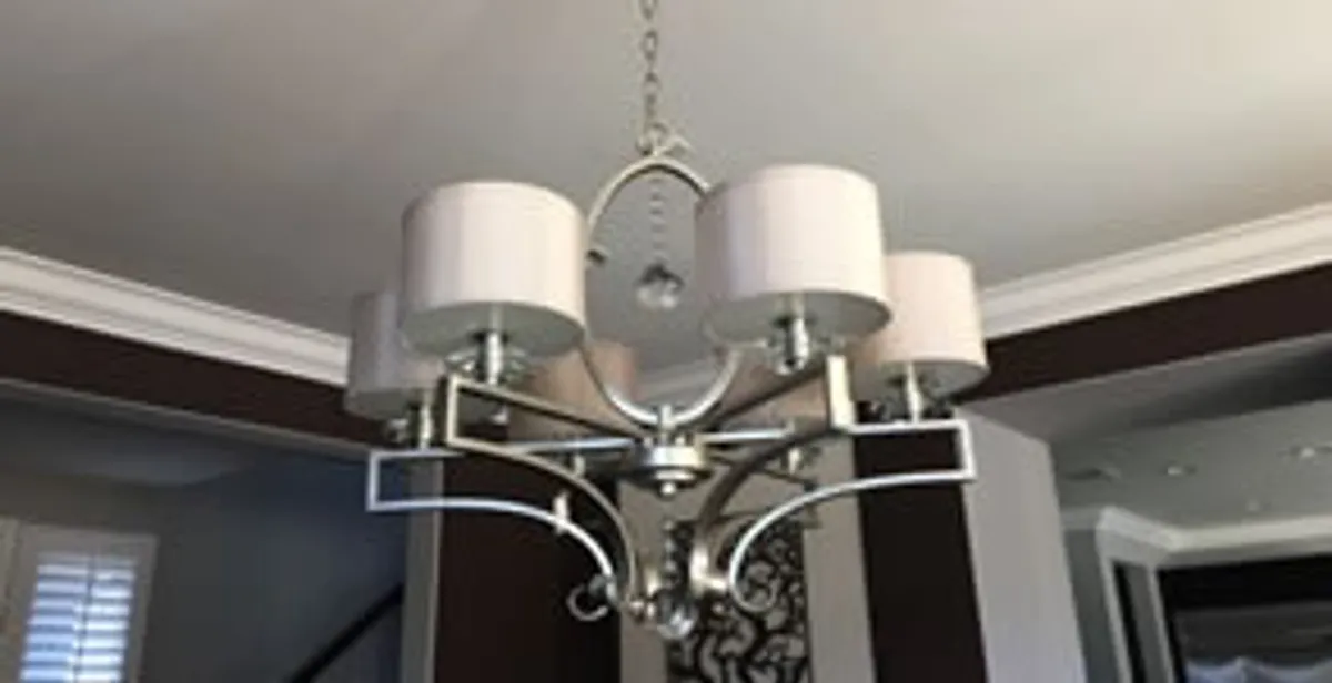 Modern chandelier installation with multiple light fixtures in Escondido, CA