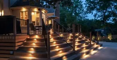 Residential electrician installing outdoor lighting for home safety in Escondido, CA