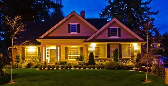 security light installation services illuminating a residential exterior at night in Escondido, CA