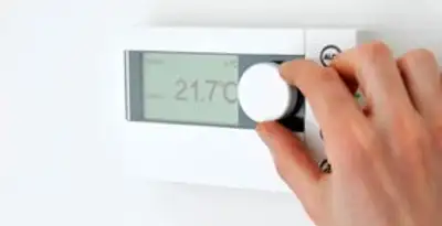 Thermostat installation service with professional adjusting temperature control in Escondido, CA