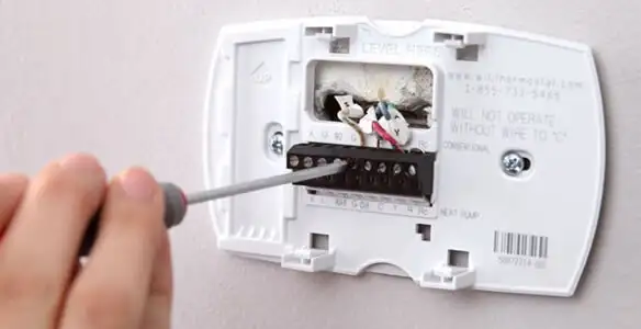 Thermostat installation service with proper wiring and secure wall mounting in Escondido, CA